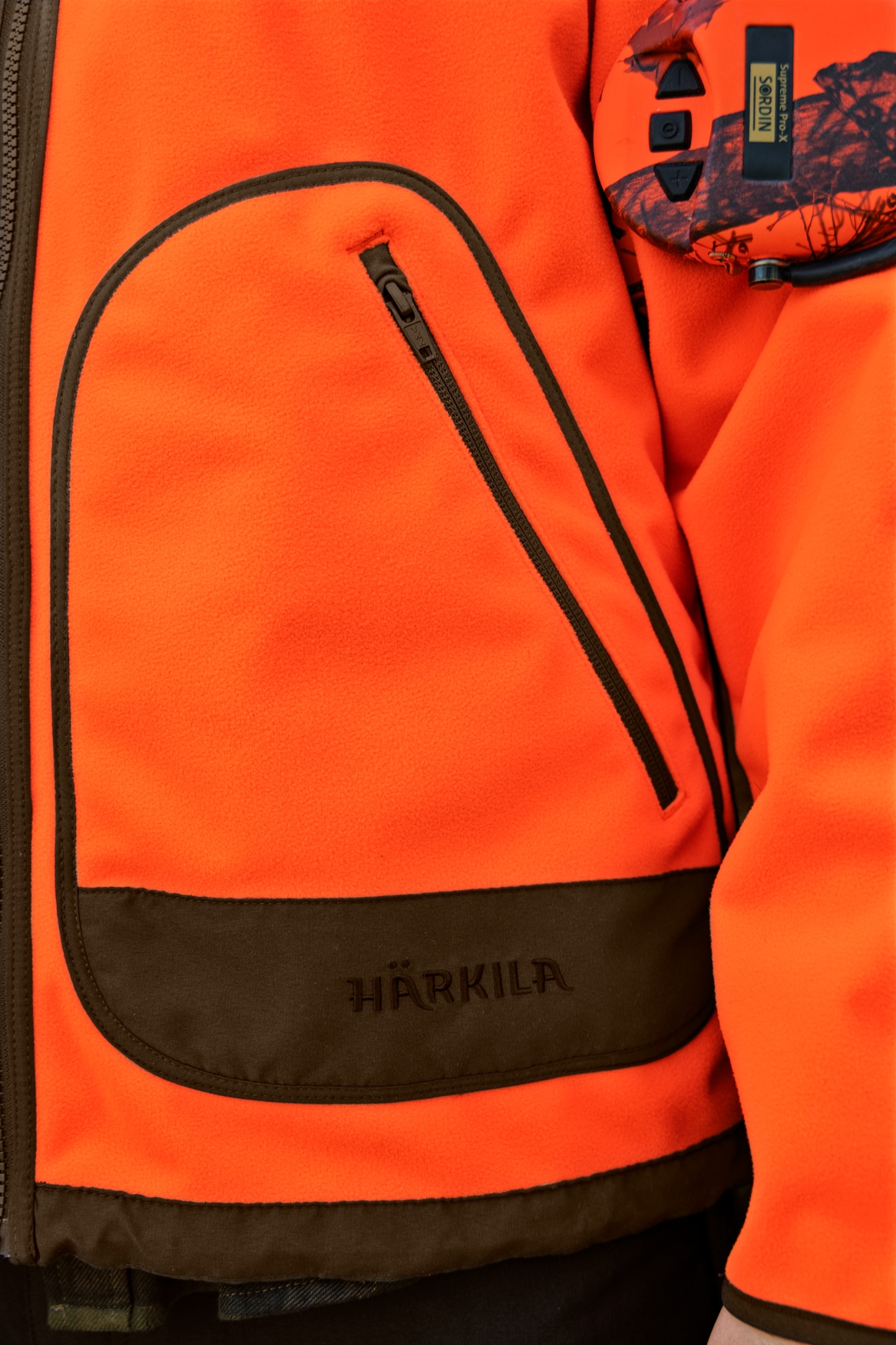Härkila Kamko Blaze Rev. Fleecejakke Orange Blaze/Willow Green